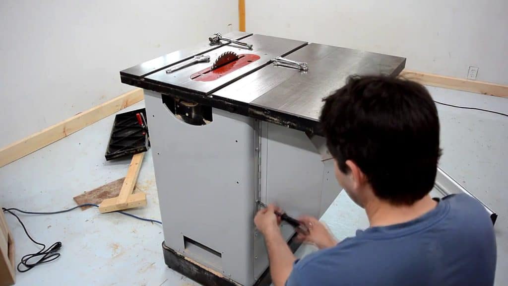 a person working on his delta hybrid table