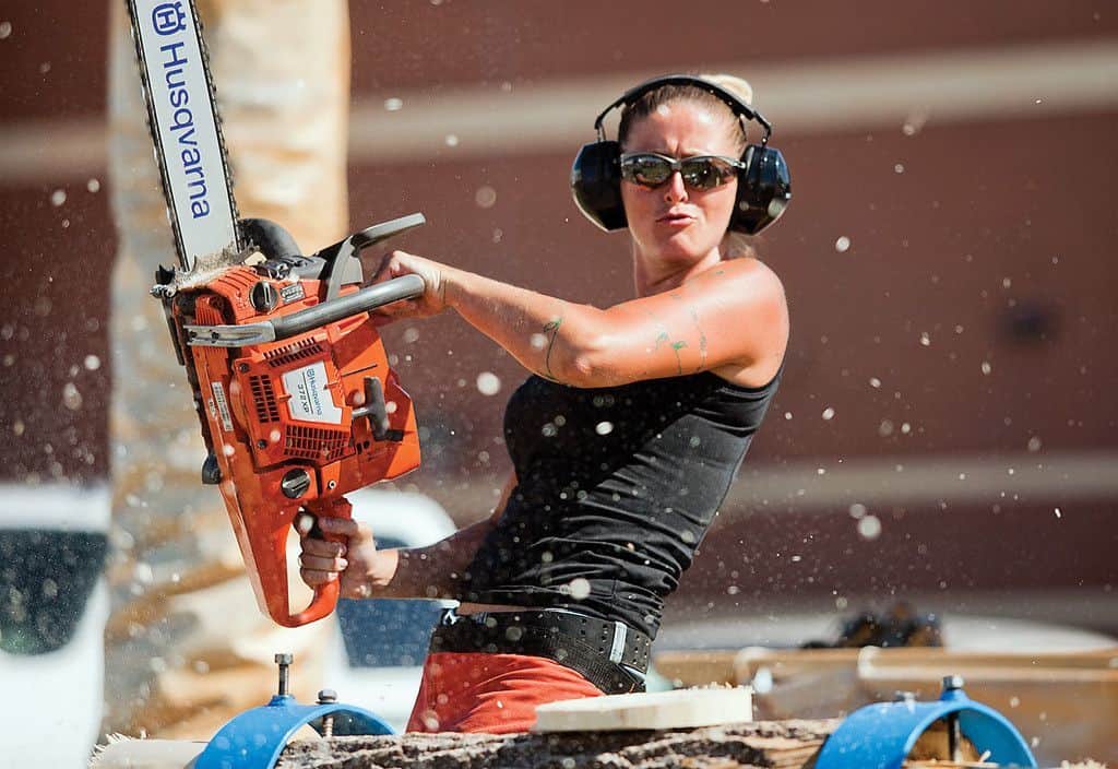 woman-using-a-chainsaw